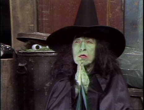 Wicked witch standing with flickering lights and audio effects